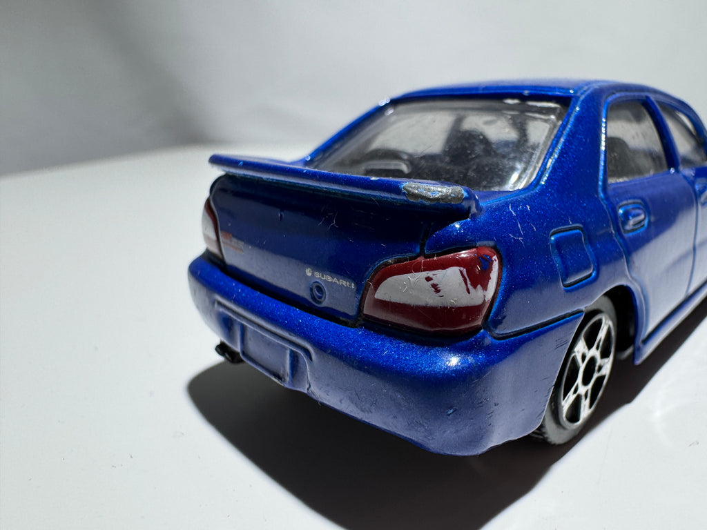 1:43 Maisto Subaru Impreze WRX STI Blau #316