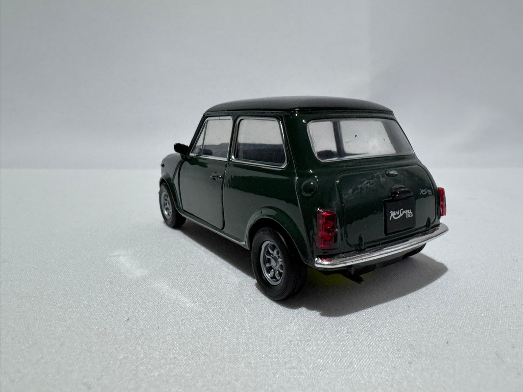 1:38 Welly Mini Cooper 1300 1990-1996 Grün-Schwarz #008