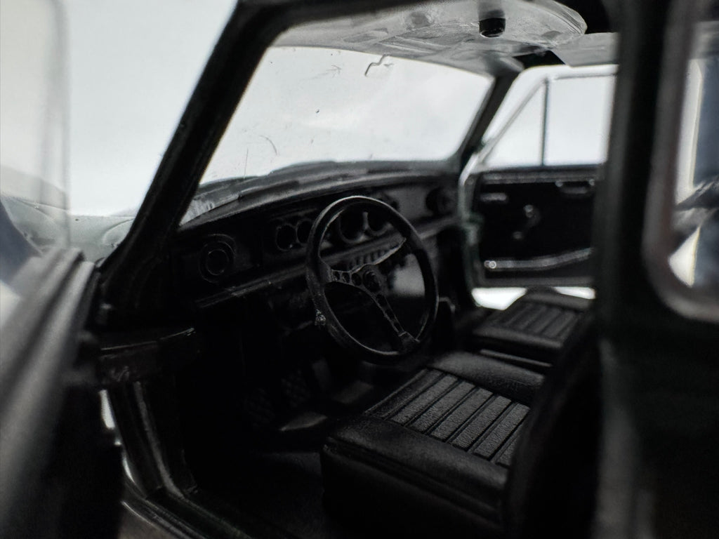 1:38 Welly Mini Cooper 1300 1990-1996 Grün-Schwarz #008