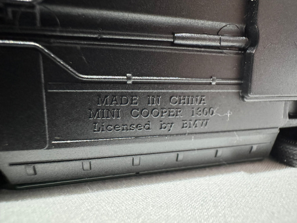 1:38 Welly Mini Cooper 1300 1990-1996 Grün-Schwarz #008