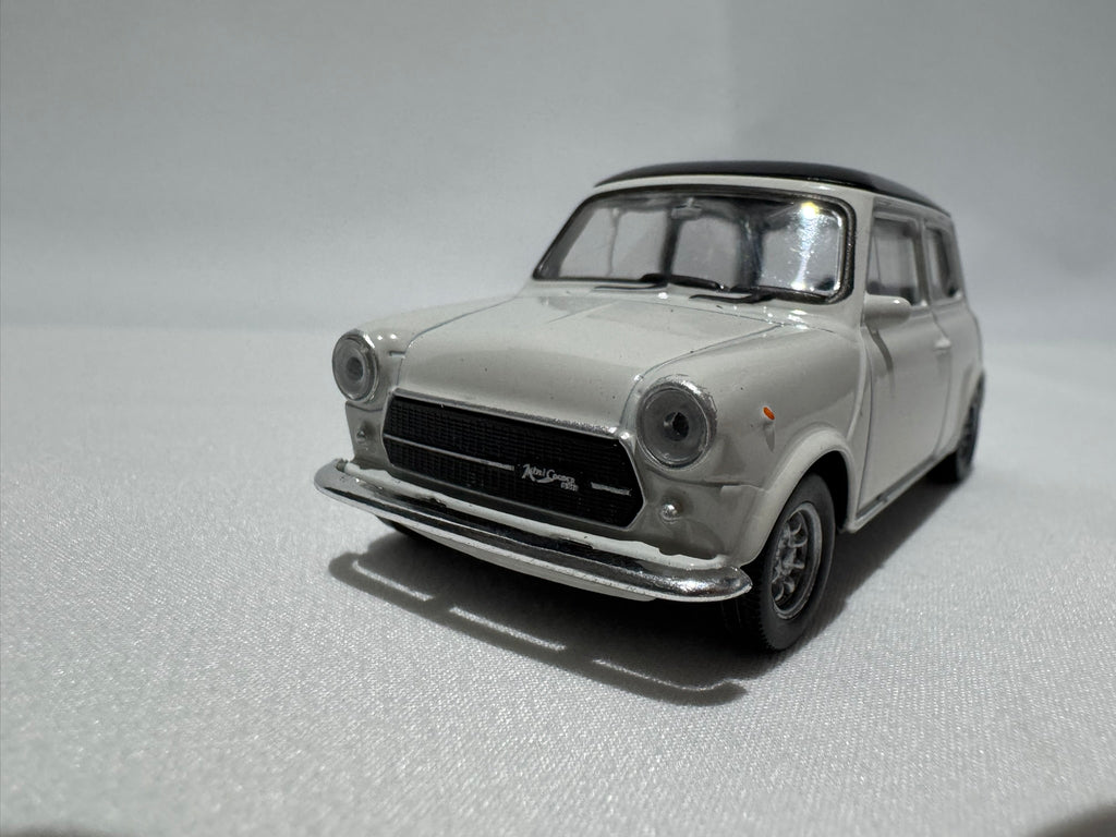 1:43 Welly Mini Cooper 1300 1990-1996 Weiß-Schwarz #022