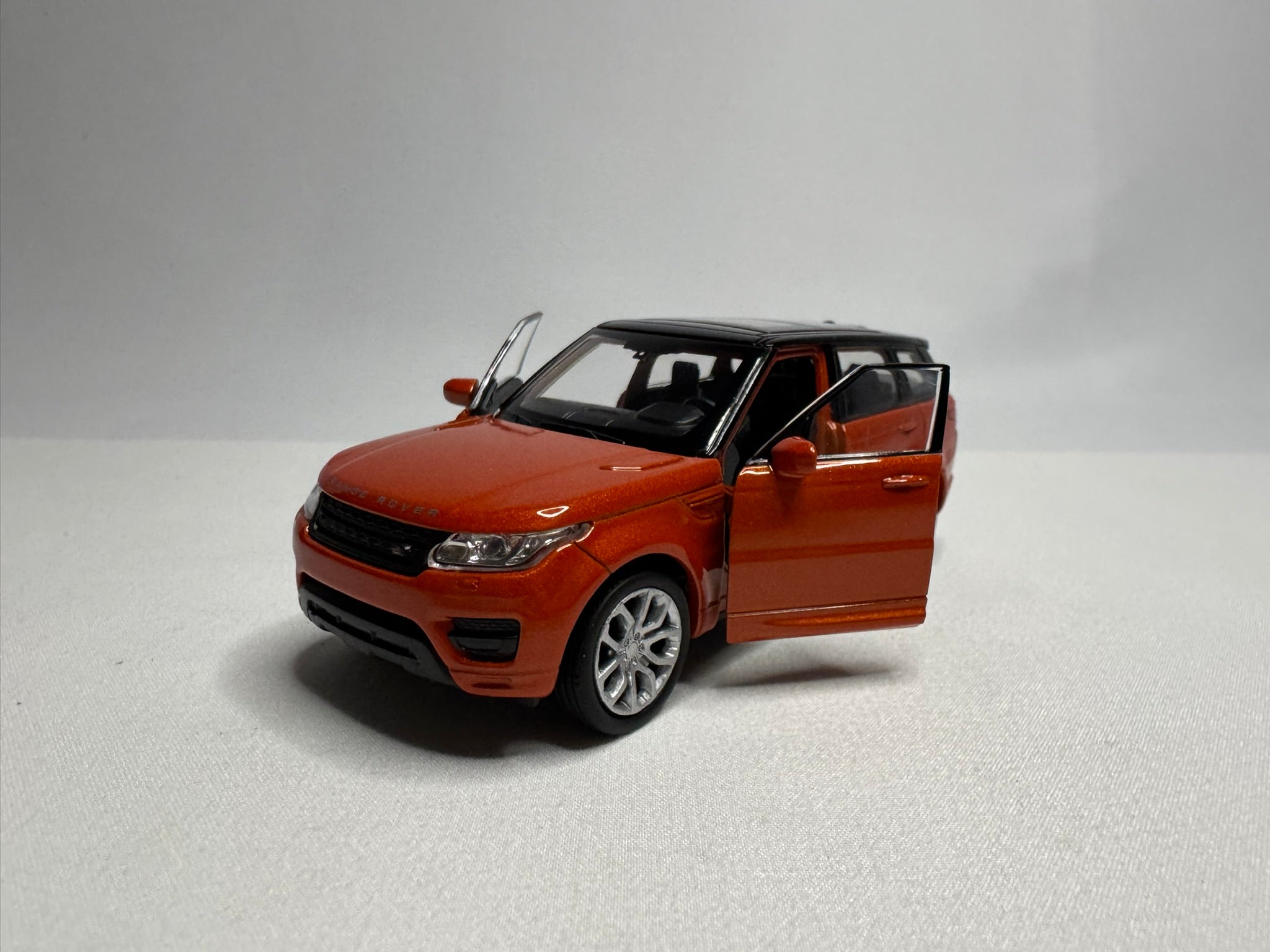 1:38 Welly Range Rover Sport 2013-2022 L494 Orange-Schwarz #104