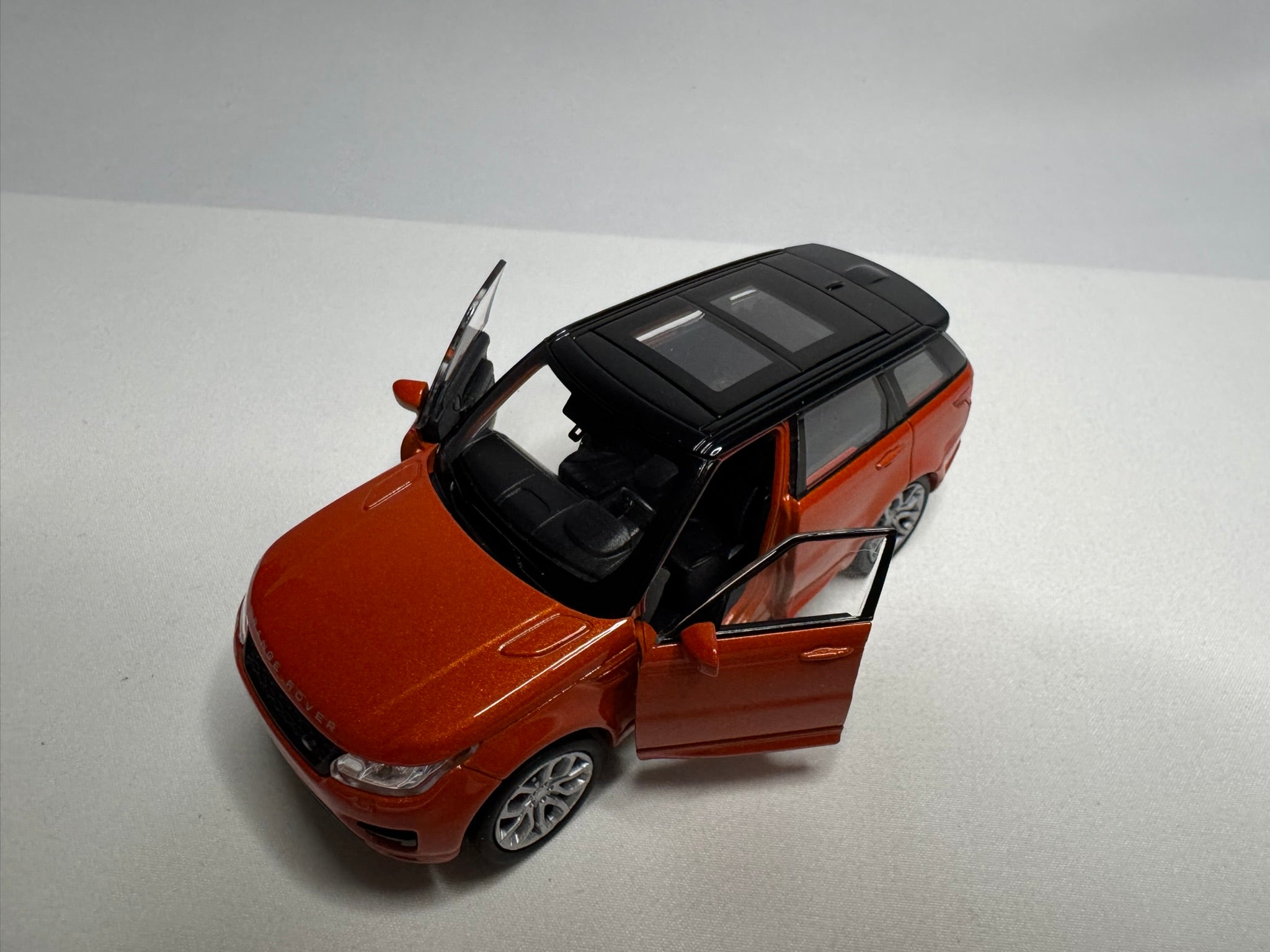 1:38 Welly Range Rover Sport 2013-2022 L494 Orange-Schwarz #104
