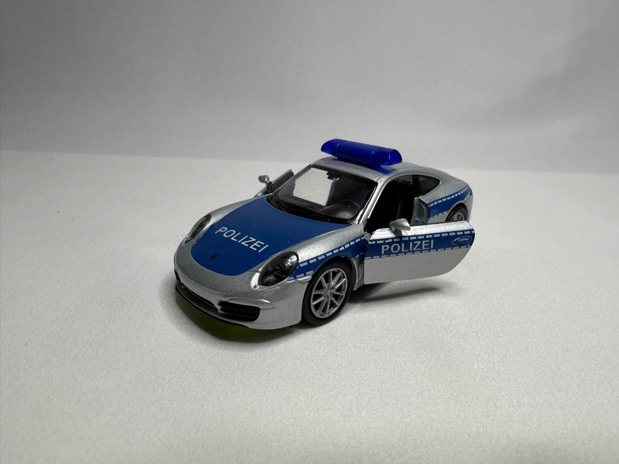 1:38 Welly Porsche 911(991) Carrera S 2011-2019 Polizei #123